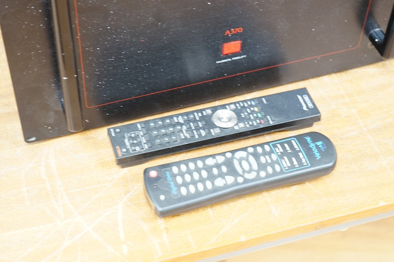 A Musical Fidelity A370 power amplifier for rack mounting, together with a Power Wedge Ie power supply distributor by Audio Power Industries (PW Ie), (2). Condition - fair, sold untested.